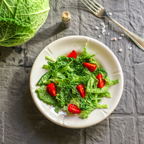 salad savoy cabbage and tomatoes. Top view. food background copy space