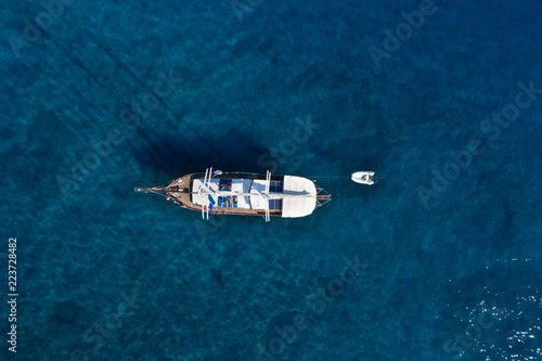 Sailboat view from above, beautiful boat in the tourquise sea