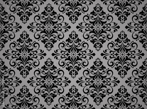 Wallpaper in the style of Baroque. Seamless vector background. Black and grey floral ornament. Graphic pattern for fabric, wallpaper, packaging. Ornate Damask flower ornament