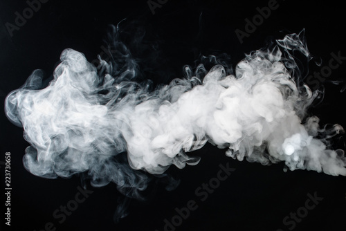 Abstract smoke on a dark background photo