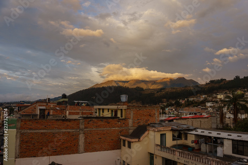 Vulcano in the background of the cityscape of otavalo, ecuador
