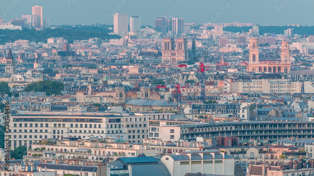 Aerial panorama above houses rooftops in a Paris day to night timelapse