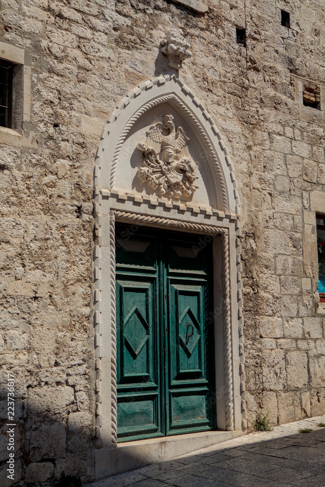 Portal with eagle of Rossini palace in Sibenik