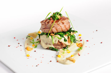 Veal medallions with spinach