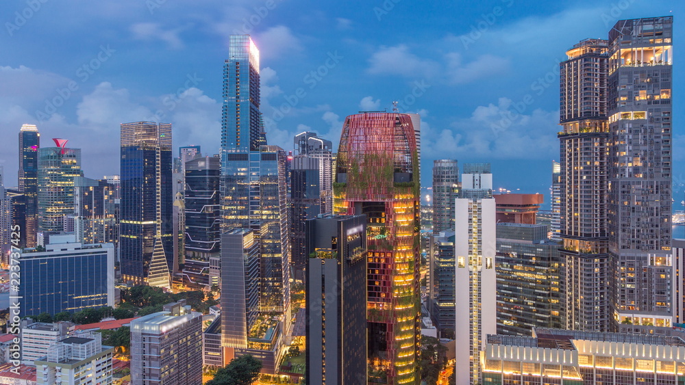 Fototapeta premium Aerial view of Chinatown and Downotwn of Singapore day to night timelapse