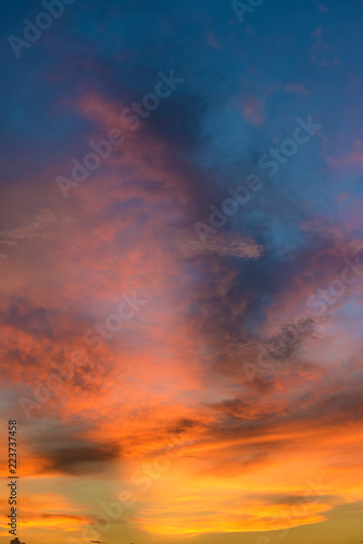 Beautiful twilight sky with orange and blue colour dramatic cloud.