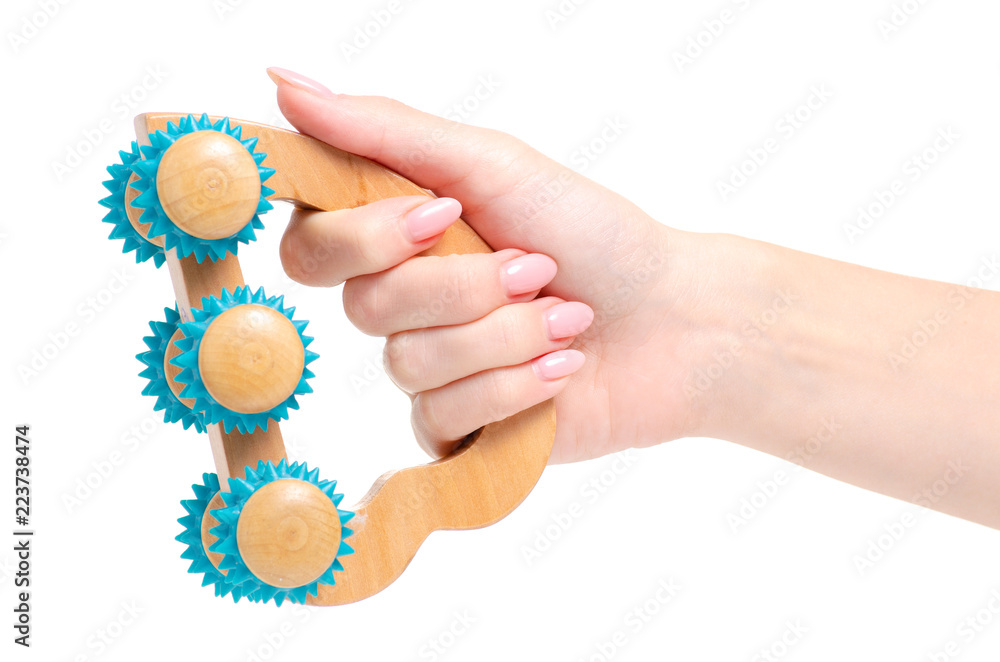 Hand-held massager in hand on white background isolation Hand-held massager in hand on white background isolation