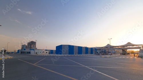 Sunset at free zone of Ajman timelapse. Ajman is the capital of the emirate of Ajman in the United Arab Emirates.