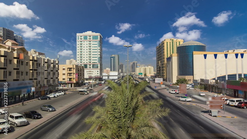 Cityscape of Ajman from bridge at day timelapse. Ajman is the capital of the emirate of Ajman in the United Arab Emirates.