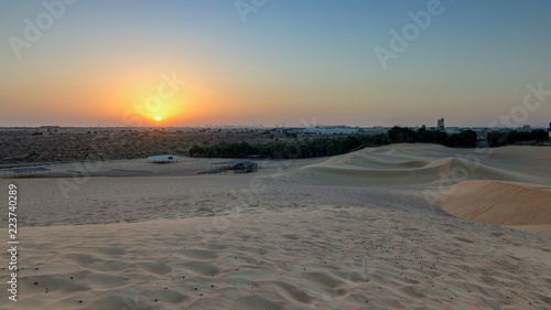 Extreme desert landscape timelapse with orange sunset, beautiful sandy background with hot sunlight, United Arab Emirates, Ajman