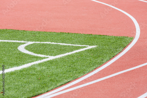 Marking the angle of the football field with artificial surface.