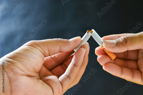 Cigarettes with a soft-focus background is dark.