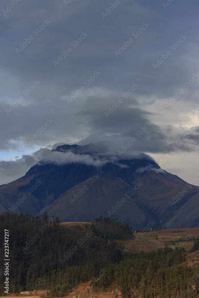 Vulcano in the background of the cityscape of otavalo, ecuador Vulcano in the background of the cityscape of otavalo, ecuador