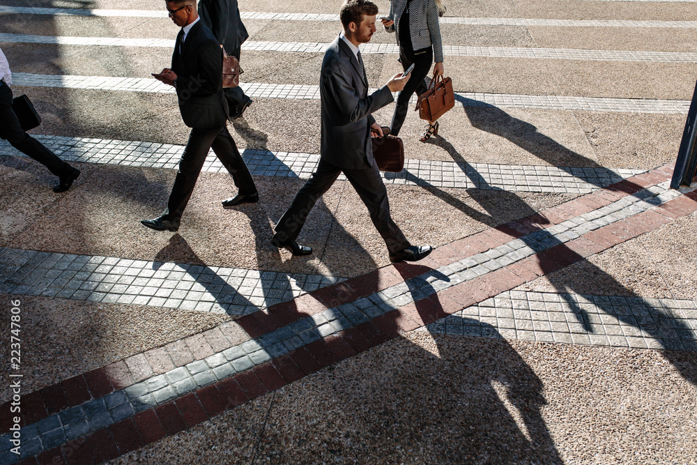 Business people walking to office in the morning on a busy stree Stock  Photo | Adobe Stock