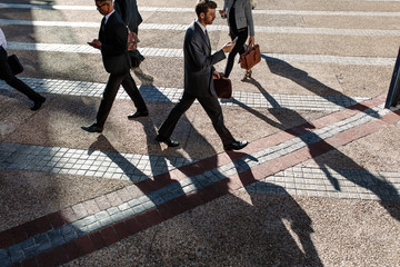 Business people walking to office in the morning on a busy stree