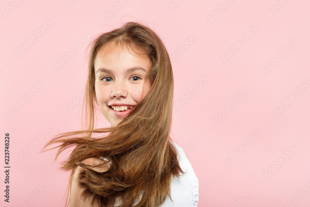 healthy hair and beauty hacks for kids. happy smiling young adolescent girl portrait on pink background. shampoo conditioner and other products advertisement concept. Stock Photo | Adobe Stock healthy hair and beauty hacks for kids. happy smiling young adolescent girl portrait on pink background. shampoo conditioner and other products advertisement concept. Stock Photo | Adobe Stock