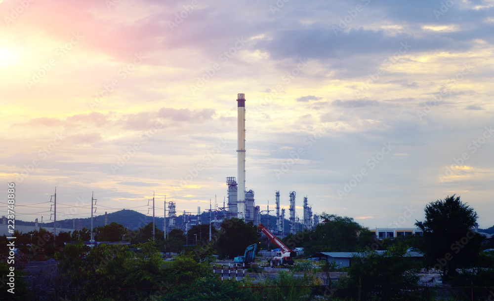 Fototapeta premium Industrial of chemical or petrochemical on sunset background.