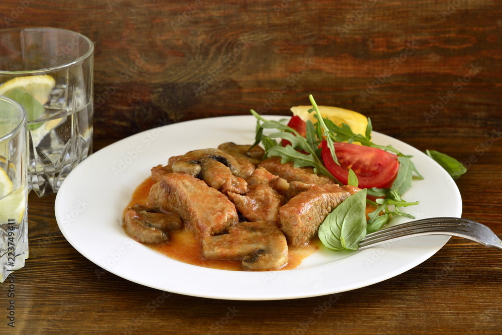 Beef Stroganoff with mushrooms and fresh vegetables Beef Stroganoff with mushrooms and fresh vegetables