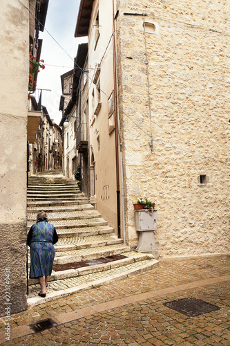 Staircase with a grandmother in the historic center of Scanno (Italy) © Angelo D'Amico