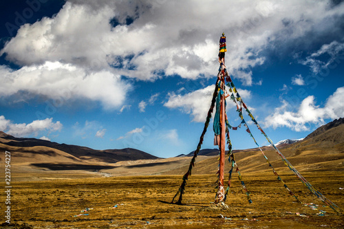 A pyramid of prayer flags flutters in the wind along the Friendship Highway between Lhasa in Tibet and Kathmandu in Nepal