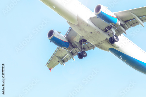 plane lands, landing gear, turbines, against the sky, close-up
