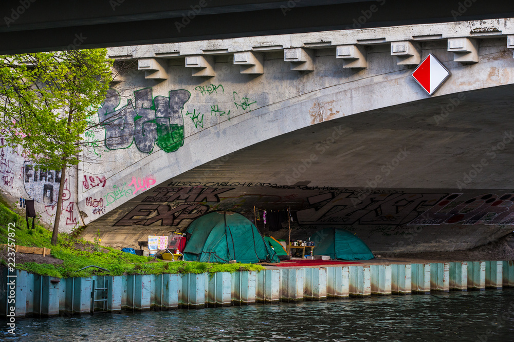 tent under the bridge Photos | Adobe Stock