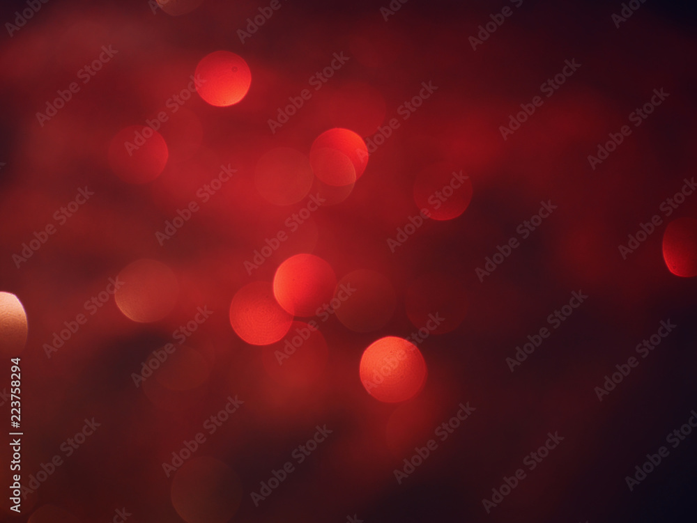 Christmas Red Blurred background lights. New Year background. Abstract defocused gold, white, red and yellow glitters texture. Shining glowing effects Christmas Red Blurred background lights. New Year background. Abstract defocused gold, white, red and yellow glitters texture. Shining glowing effects