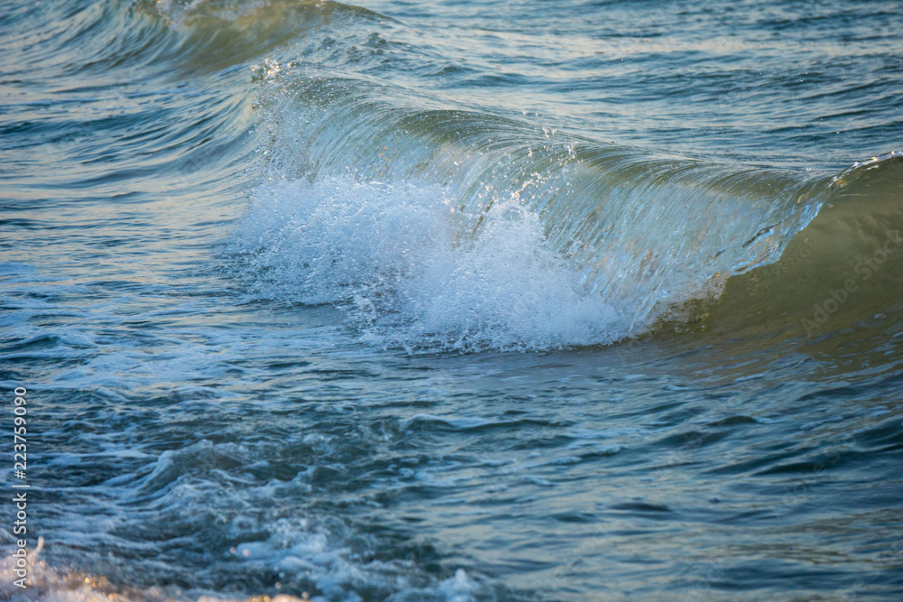 Small and peacefull waves hitting the shore Small and peacefull waves hitting the shore