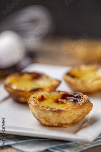 Typical Portuguese custard pies - "Pastel de Nata" or "Pastel de Belem". traditional portuguese pastry.