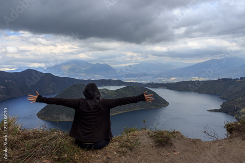 View on a tourist at vulcano lake cuicocha close to otavalo, ecuador