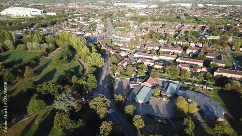 Aerial north London England residential park area descend. Near Tottenham Hotspur Football Club training and practice fields. Green game areas and residential streets in urban suburbs. photo