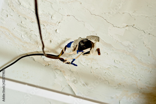 Old, unsafe wiring in the apartment. Safety violation