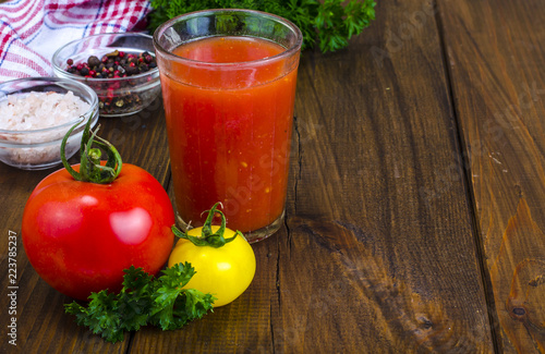 Natural freshly squeezed tomato juice in glass