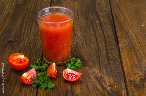 Natural freshly squeezed tomato juice in glass