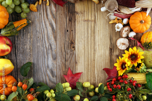 Autumn nature concept. Fall fruit and vegetables on wood. Thanksgiving dinner