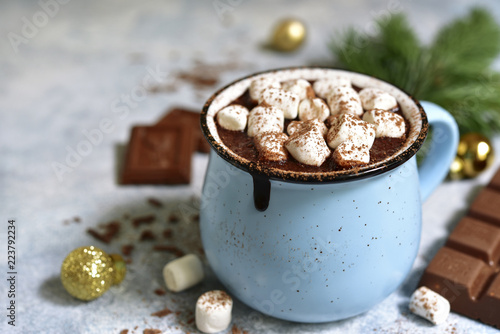 Homemade festive hot chocolate in a blue vintage cup.
