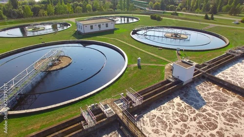 Aerial view to sewage treatment plant. Grey water recycling. Waste management theme. 