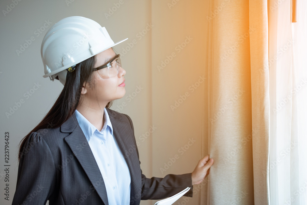 Portrait asia woman engineer working at construction site Portrait asia woman engineer working at construction site
