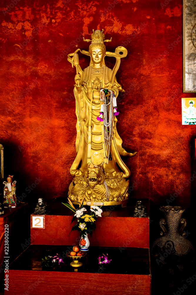 A Buddhist idol at the base of Big Buddha Phuket