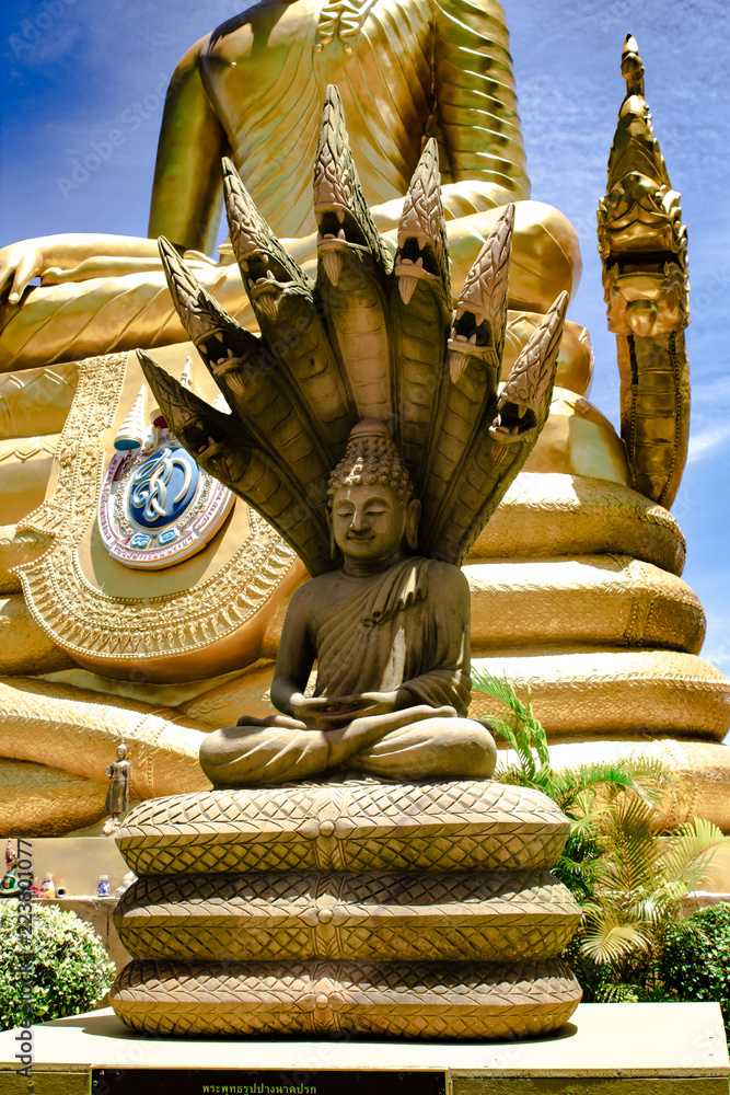 Buddha in Naga statue at Big Buddha Monument, Phuket Thailand, Rear Garden Area