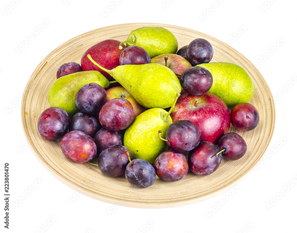 Ripe fruit on wooden plate Ripe fruit on wooden plate