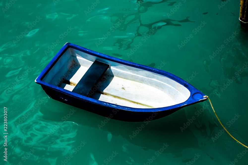 A blue dingy at Chalong Pier, Phuet Thailand