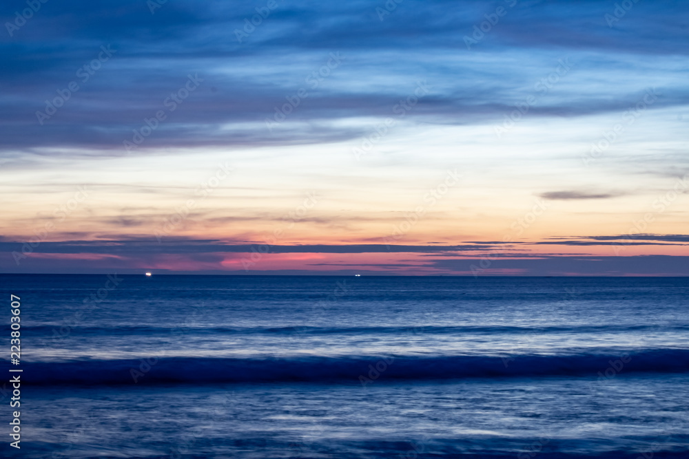 Blue Shaded Sunset at Karon Beach Over the Ocean