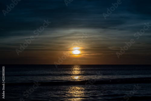 Obraz na płótnie Blue Shaded Sunset at Karon Beach Over the Ocean w salonie