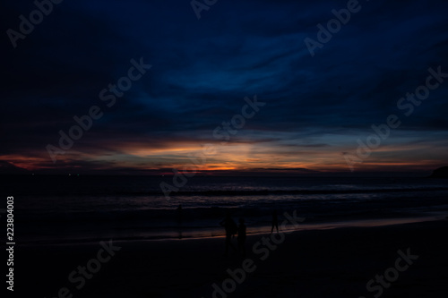 Obraz na płótnie Blue Shaded Sunset at Karon Beach Over the Ocean w salonie