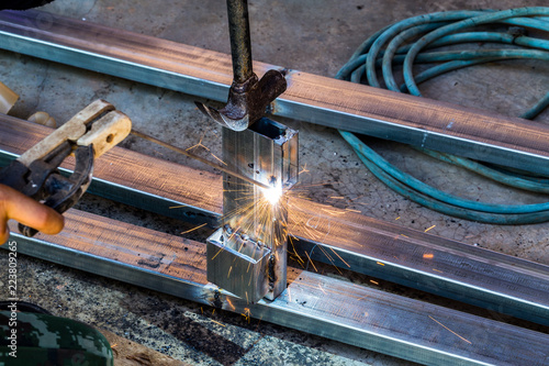Workers are welding steel