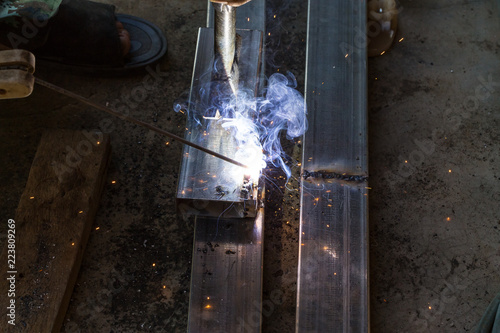 Workers are welding steel