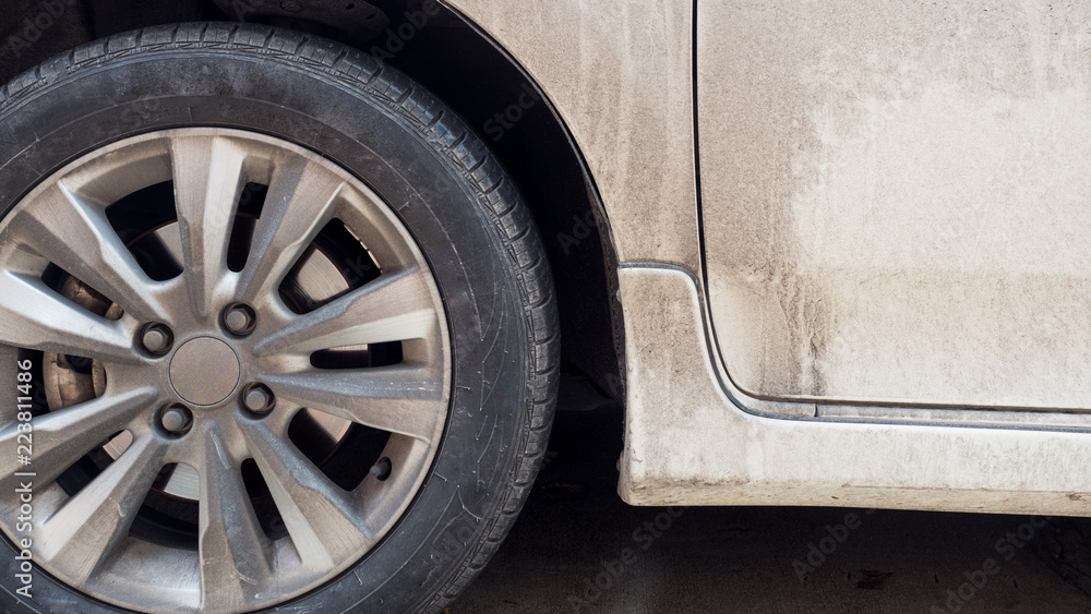 Fragment of dirty car close-up