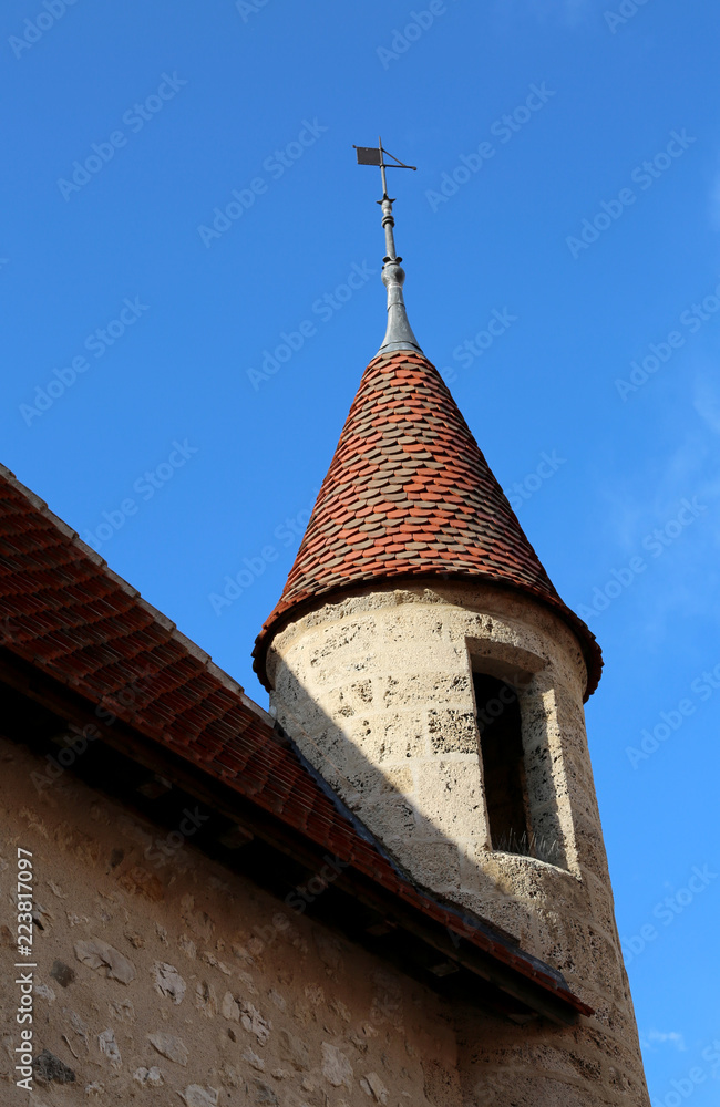 Ancient medival turrent with small weathervane