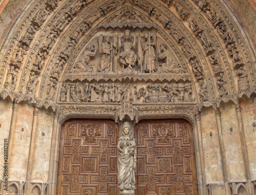 The tympanum and the statue of La Virgen Blanca (replica) in the Last Judgement portal of the Santa Maria de Leon Cathedral - Leon, Castile and Leon, Spain